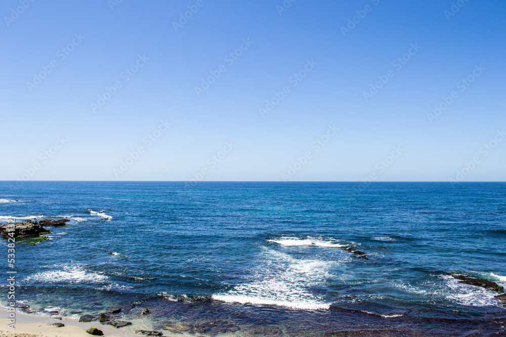 Ocean view of crashing waves in southern California west coast