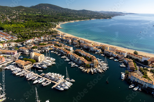 Aerial view on Gulf of Saint-Tropez, sail boats, houses of Port Grimaud and Port Cogolin, summer vacation in Provence, France photo