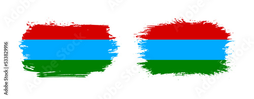 Set of two grunge brush flag of Karelia on solid background