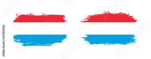 Set of two grunge brush flag of Luxembourg on solid background