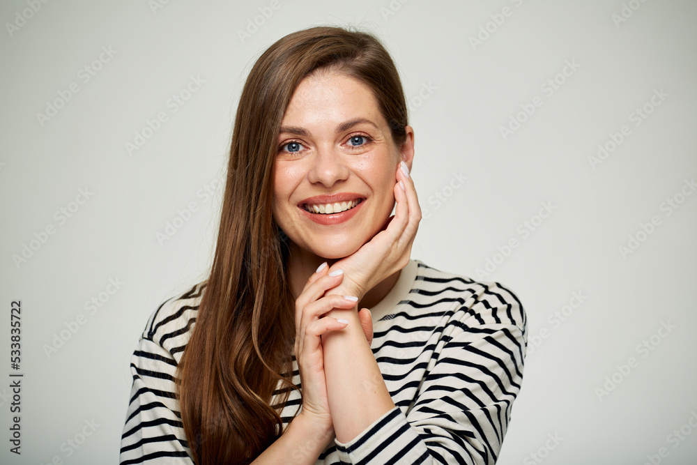 Smiling woman face close up portrait with natural skin isolated on white background. Smiling woman face close up portrait with natural skin isolated on white background.