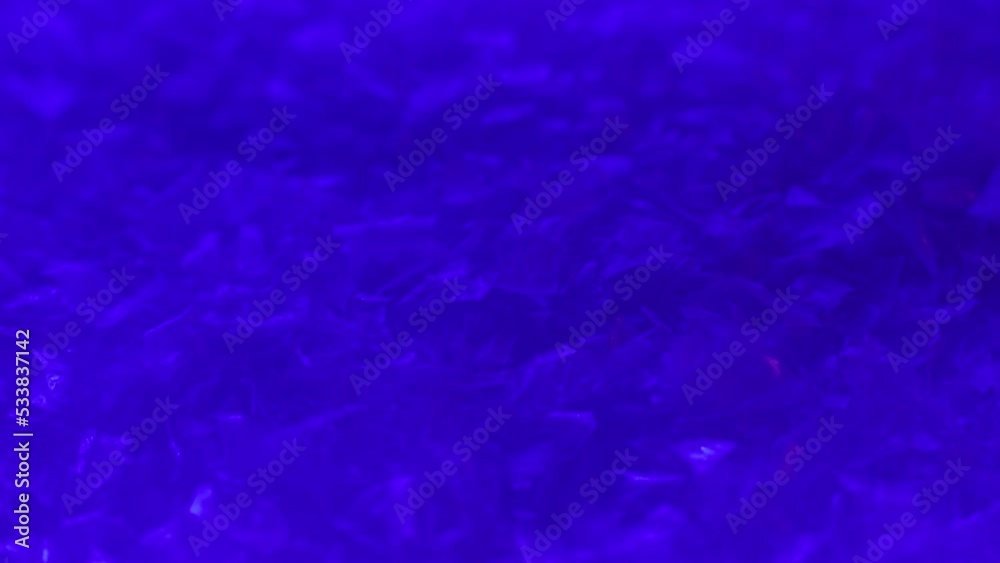 Moving shiny glitter wallpaper with blue strobe flashes is perfect for Christmas, New Year or any other holiday background or police chronicle