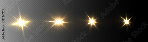 Glow of golden sparks of light on a transparent background. Blurred glitter vector collection. Explosive Sun Flare Star Space
