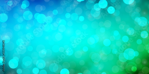 Light Blue, Green vector background with circles.