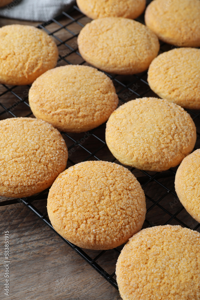 Many tasty sugar cookies on wooden table, closeup Many tasty sugar cookies on wooden table, closeup