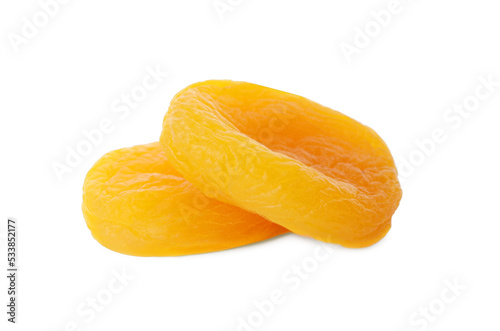 Two tasty apricots on white background. Dried fruits