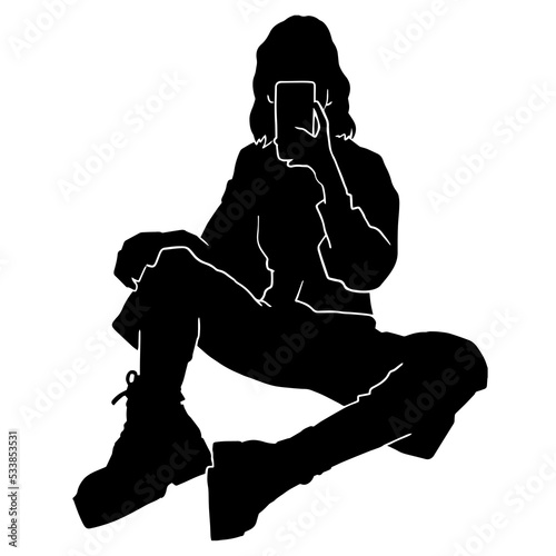 silhouette of a woman sitting and taking a selfie