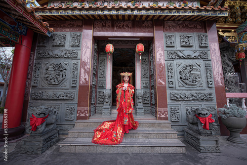 Portrait asian woman wearing traditional Chinese dress cheongsam for Chinese New Year