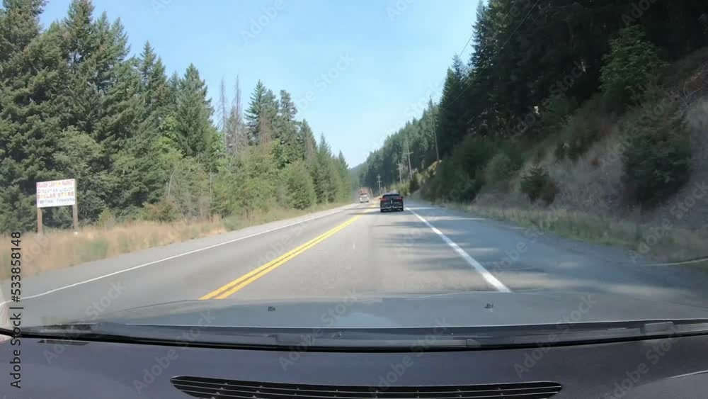 High Speed Timelapse POV Driving on Sunny Mountain Road through Forest High Speed Timelapse POV Driving on Sunny Mountain Road through Forest