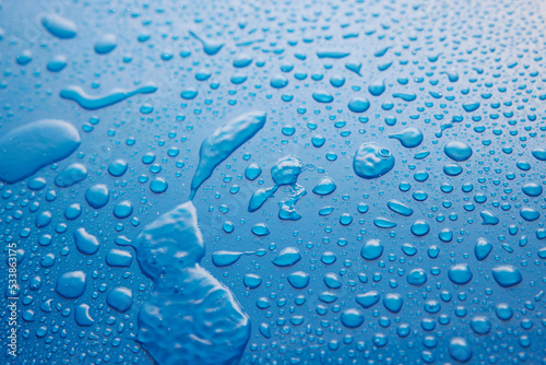 Fotografía Background with spilled drops of water