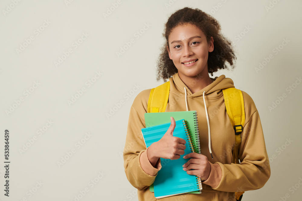 College Students with Textbooks College Students with Textbooks