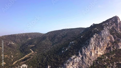 Drone shot of a Beautiful mountain in North Cyprus camera zoom out photo