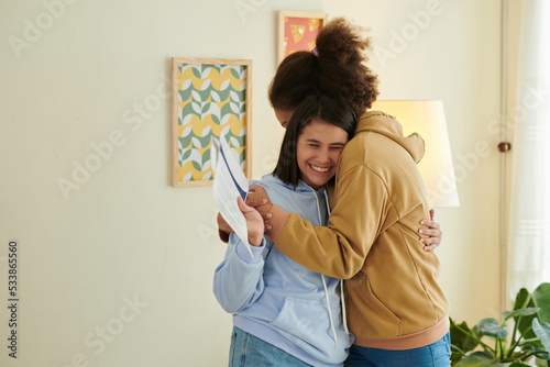 Teenage Girl Hugging Her Friend