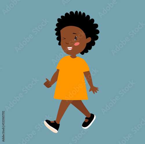 Cute African American girl. The baby is walking. Cartoon African girl. The girl walks happily. © olga