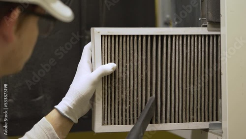 hvac filter replacing. Replacing the filter in the central ventilation system, furnace. Replacing Dirty Air filter for home central air conditioning system. Change filter in rotary heat exchanger