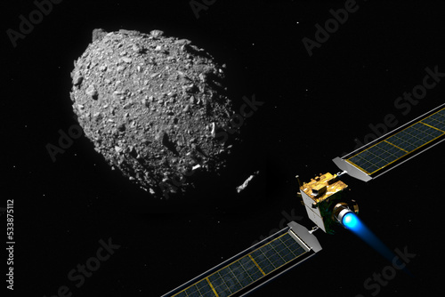Fototapeta Naklejka Na Ścianę i Meble -  DART satellite on collision course to impacting the asteroid DIMORPHOS to deflect its orbit. This image elements furnished by NASA: https://www.nasa.gov/specials/pdco/#dart