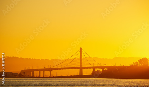 San Francisco Oakland Bay Bridge landmark  beautiful sunrise with spectacular sky. Travel to California  United States.