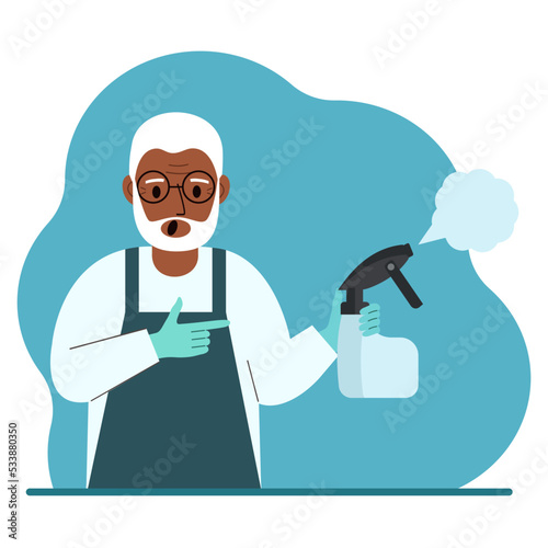 A man in gloves holds a spray bottle with disinfectant liquid, antiseptic or detergent. Home disinfection and hygiene.