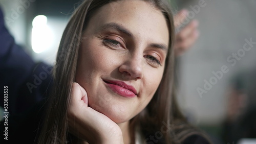 Portrait of a happy young woman smiling at camera. Closeup girl face