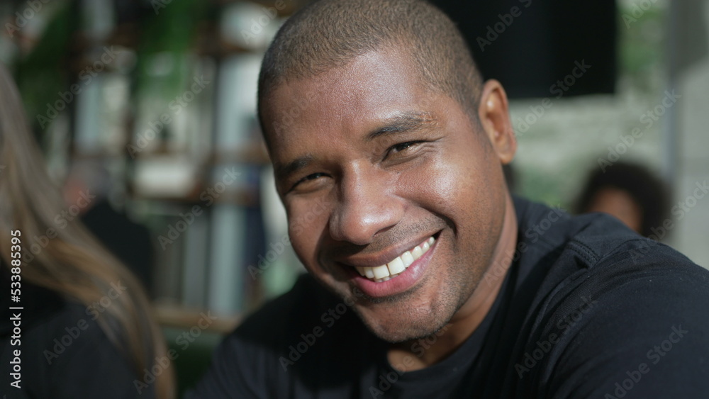African American man portrait face smiling at camera. A charismatic black person smiles African American man portrait face smiling at camera. A charismatic black person smiles