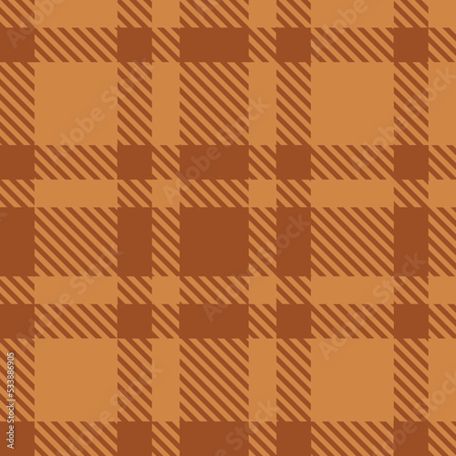 Seamless pattern brown ohre tartan vector illustration. Plaid background. Classic fashion wool pattern. photo