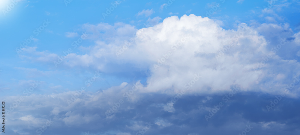 Fototapeta premium White massive clouds on blue sky