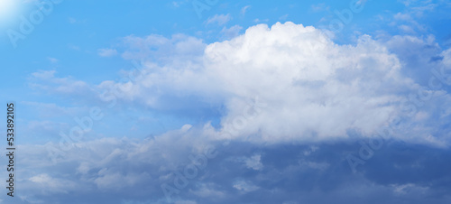 Fototapeta Naklejka Na Ścianę i Meble -  White massive clouds on blue sky
