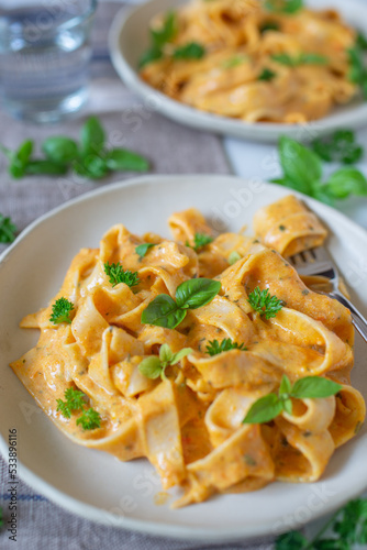 healthy home made pumpkin pasta tagliatelle on a table