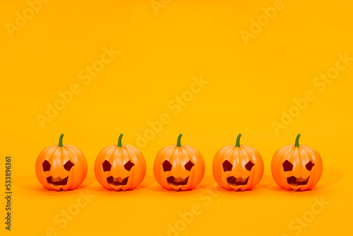 Pumpkins standing in a row. 3d illustration.