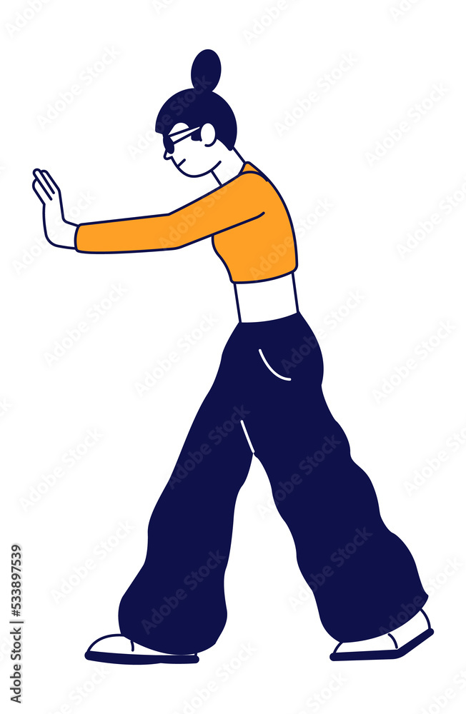 Obraz premium Pushing woman. Girl in wide pants standing. Side view