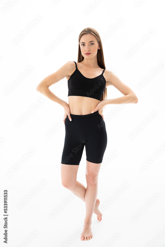 Beautiful sporty woman on white background Beautiful sporty woman on white background