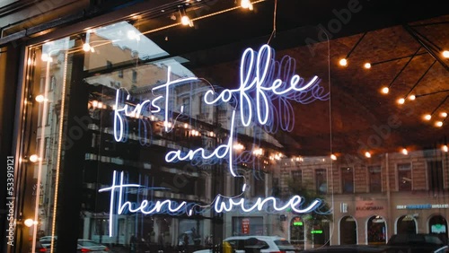 sign first coffee and wine restaurant window marketing. High quality 4k footage. city business food drinks