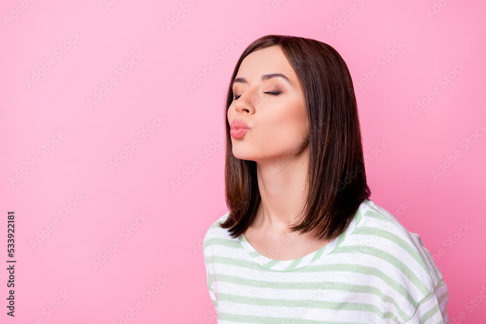 Portrait of gorgeous adorable pretty girl with bob hairdo dressed striped t-shirt send kiss eyes closed isolated on pink color background Portrait of gorgeous adorable pretty girl with bob hairdo dressed striped t-shirt send kiss eyes closed isolated on pink color background