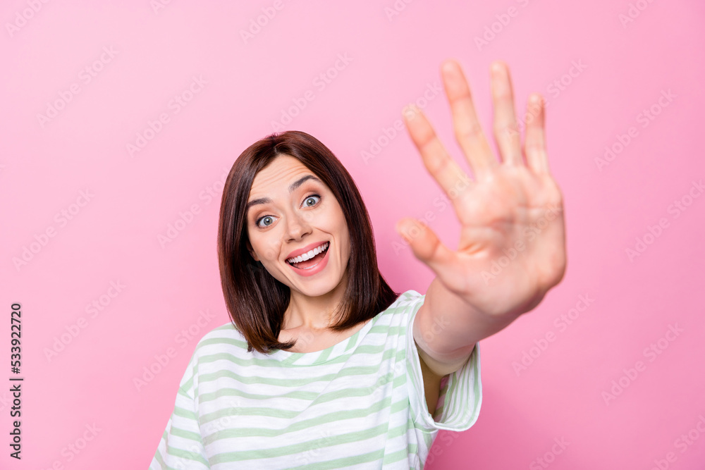 Closeup photo of young positive girl showing high five fingers positive excited funny isolated on pink color background