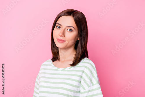 Portrait of optimistic cute sweet pretty girl with bob hairdo dressed striped t-shirt look at camera isolated on pink color background