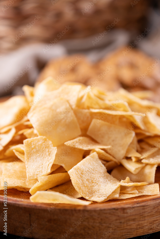 Bread chips, a typical appetizer for aperitivo, dinner in southern Italy and Sardinia. Thin baked slices of wheat flour. Copy space Bread chips, a typical appetizer for aperitivo, dinner in southern Italy and Sardinia. Thin baked slices of wheat flour. Copy space