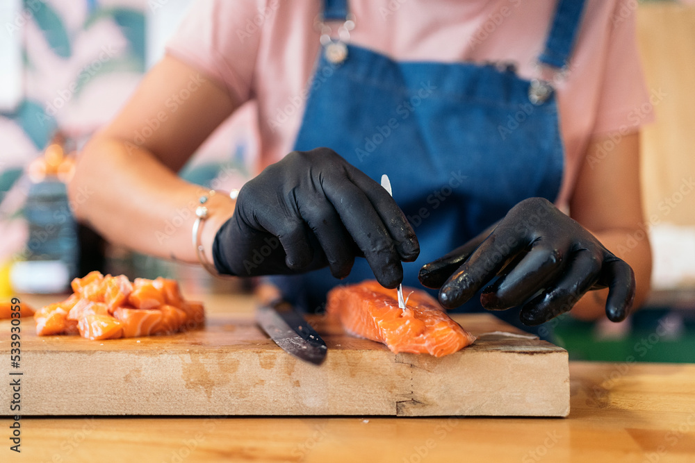 Cutting Salmon in Restaurant