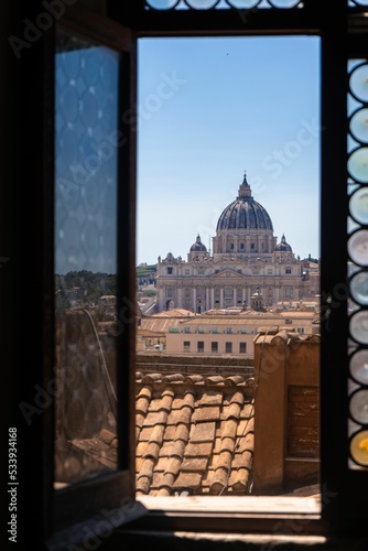 Photography Scenic view of the Saint Peter's Basilica out of the window in Rome, Italy