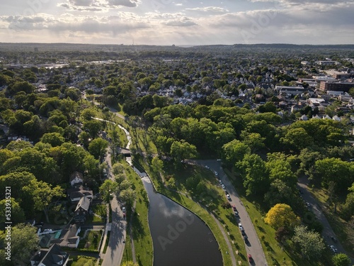 Aerial shot of the Clifton Park in New York City with the sun shining in the background