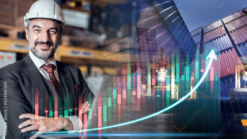 Fototapeta premium Confident man engineer investment stock finance profit graph of marketing financial increase and check for control loading containers box from Cargo freight ship for import and export, transport