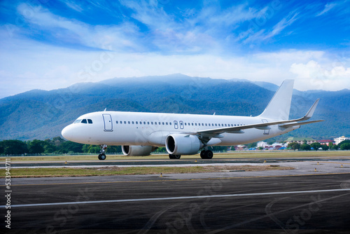 Commercial modern white airplane with nice sky,Happy journey and holidays concept. Aviation and transportation