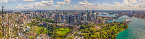 Aerial panoramic view of Sydney City NSW, Australia from the eastern side of the city showing Sydney Harbour Bridge     