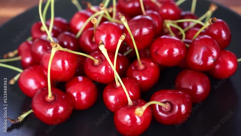 pan of a plate with red cherries pan of a plate with red cherries