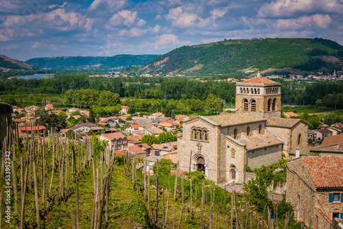 View on the vineyards of Ardeche and the romanesque church of Saint Martin in Vion, in the south of France