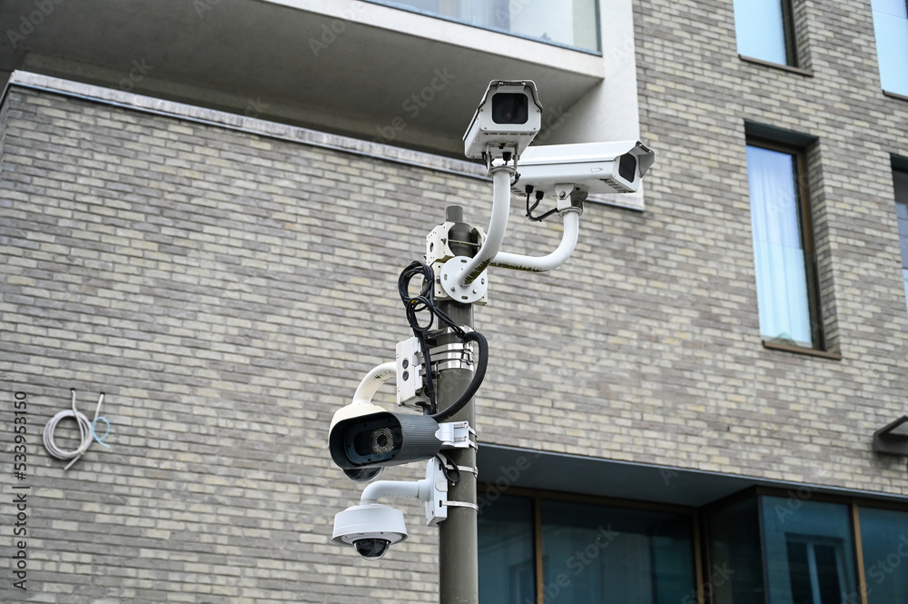 Lot of CCTV cameras on metal pole. Big brother is watching. Professional  Security cameras scanning the street. Recording video with cam. Photos |  Adobe Stock