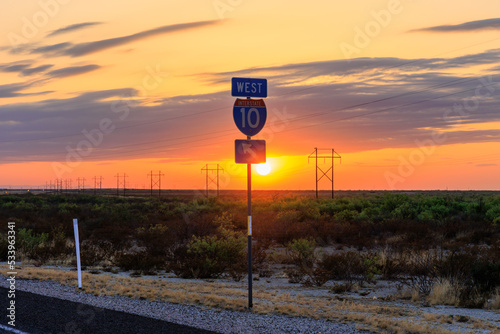 A shot of the I-10 roadsign at sunset in the west texas desert 