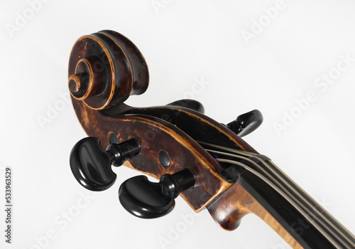 Close up of a Pegbox from an upright bass isolated on white background 