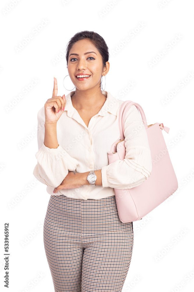 Cheerful Young woman pointing isolated on white. Cheerful Young woman pointing isolated on white.