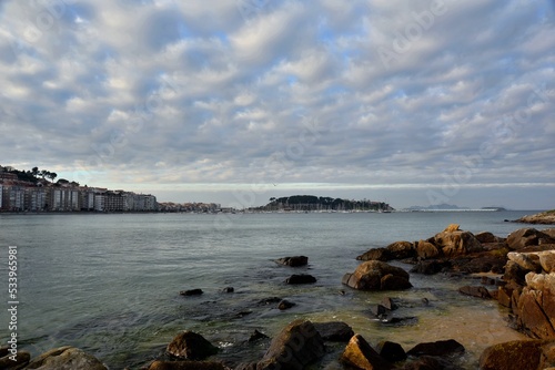 View of the town of Baiona on a cloudy day on the Way of Saint James