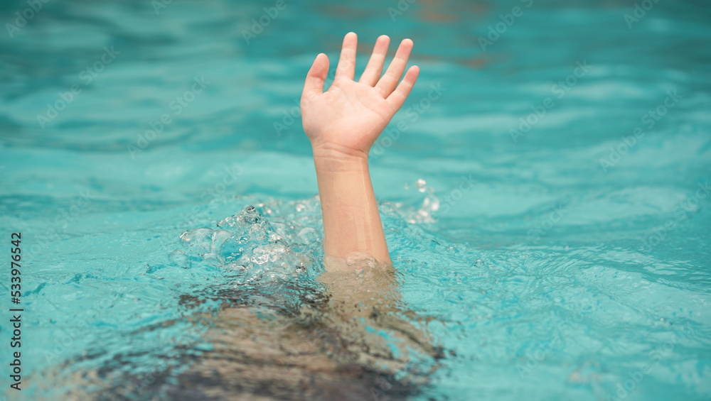 emergency kid drowing in swimming pool show up hand call for help